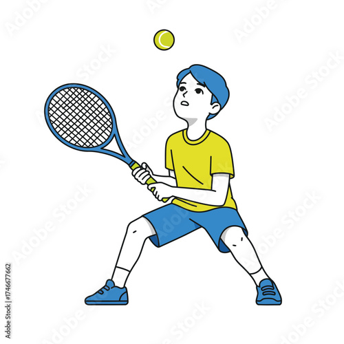A young boy in a yellow shirt and blue shorts, holding a tennis racket, intently watches a yellow ball above, poised for a game.