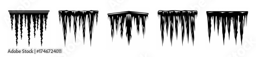 Frozen icicles forming on a roof edge during a cold winter day