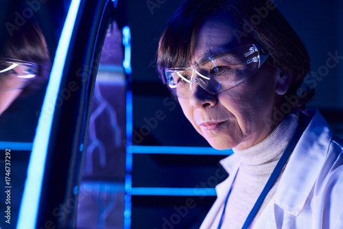 Wallpaper Mural Scientist investigates alien technology in high tech lab at Area 51 Torontodigital.ca