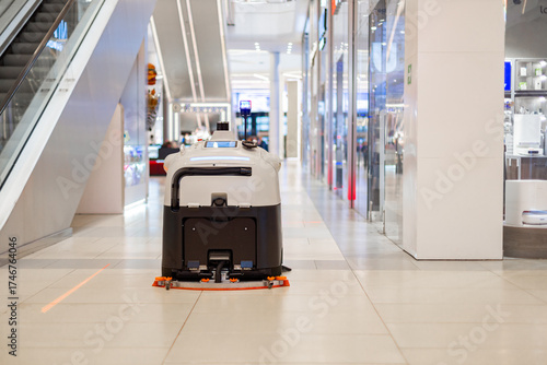  Industrial automatic robot cleaner mopping the floor in the Mall, Robot cleaner on duty