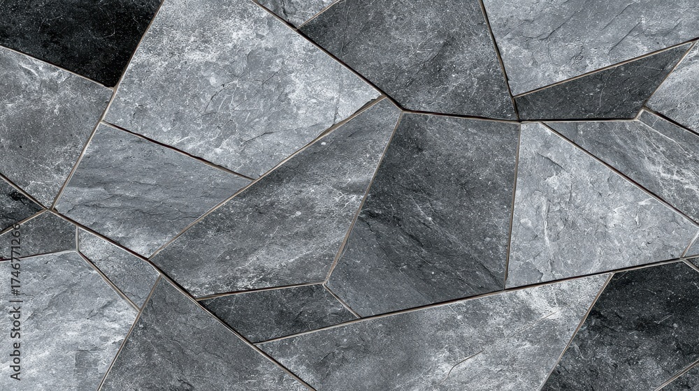 Obraz premium Irregular grey slate tiles creating a seamless geometric pattern on a wall or floor, showing a natural stone texture and an abstract background design