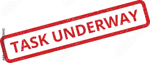Grunge rubber stamp effect indicating a task underway status, ideal for project progress tracking and ongoing work updates