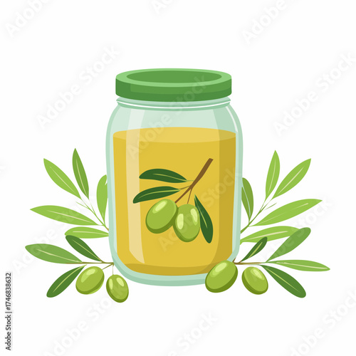 A clear glass jar of golden olive oil with a green lid surrounded by fresh olive branches