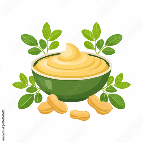 Creamy peanut butter in a green bowl with leaves and peanuts.