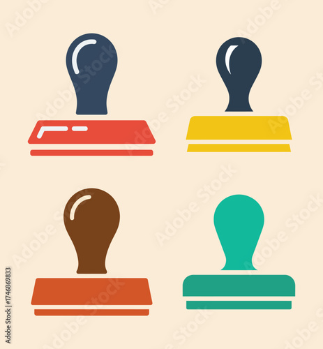 Four colorful rubber stamps arranged in a grid on a cream background office supply stationery
