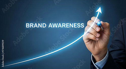 Increasing brand awareness with a rising arrow drawn by a business professional on a blue background showing business growth and positive trends
