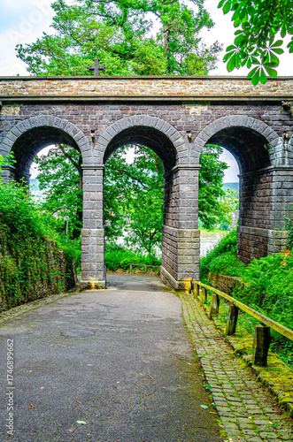 Way through the arch of a bridge 