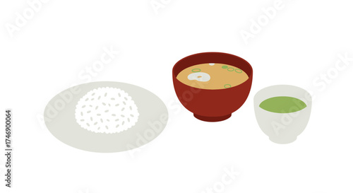 A meal of rice soup and green tea are arranged on a white surface