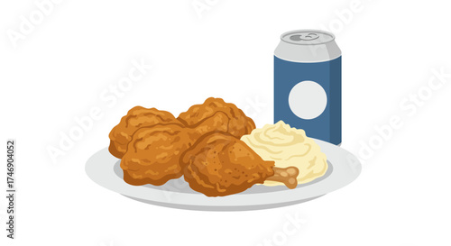 Plate with fried chicken mashed potatoes and a blue soda can