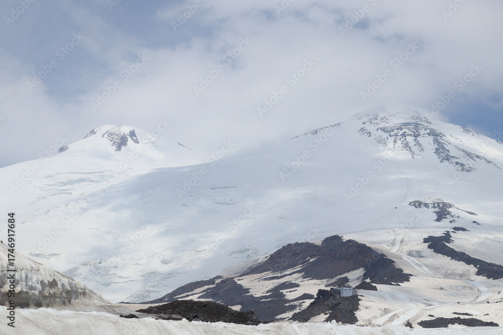 Obraz premium snow-capped double-peaked peaks of Elbrus