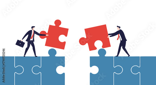 Two businessmen connecting puzzle pieces to complete a bridge.

