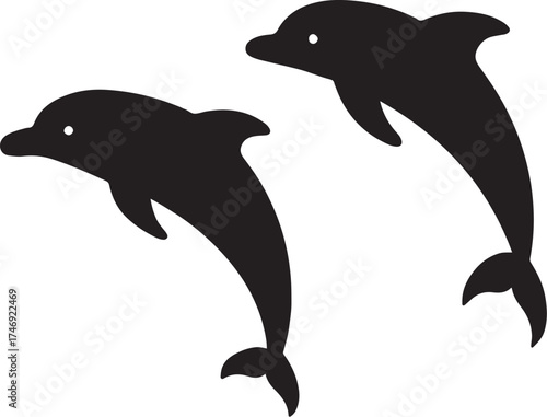 PrintTwo silhouetted dolphins leaping together in the water