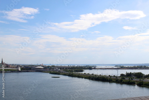Wallpaper Mural The city is visible from afar on the river bank.	 Torontodigital.ca
