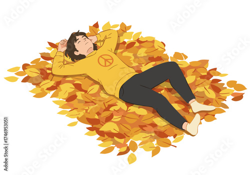 A young man relaxes amidst falling autumn leaves, wearing a peace sign shirt. A serene and peaceful image, perfect for autumn or wellness themes.