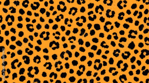 Leopard print pattern with black spots on orange background