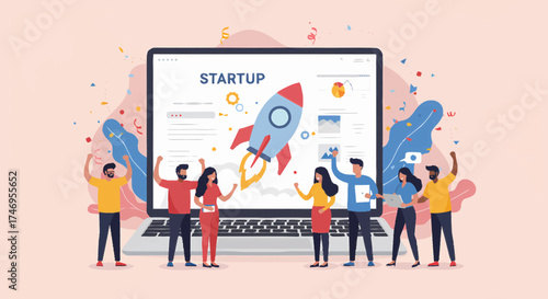 A group of people around a large laptop with a startup screen and a rocket launch illustration