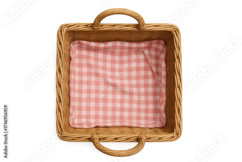 Wicker picnic basket with pink gingham cloth isolated