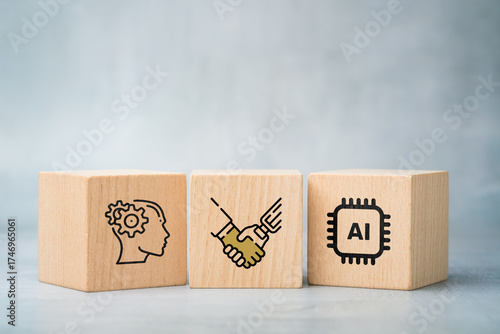 Human and AI Collaboration Concept with Handshake Icon on Wooden Blocks