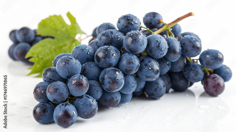 Fototapeta premium Blue Grapes with leaves isolated in white background