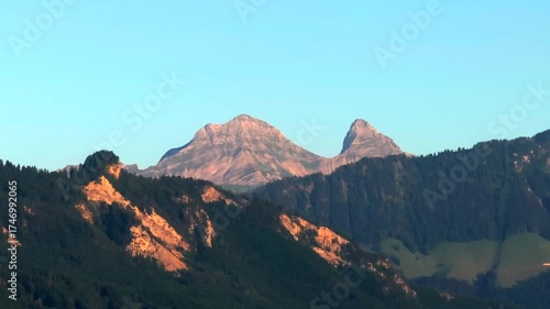 Cinematic aerial drone footage of scenic Swiss Alps. Snow-capped peaks, green valleys, and dramatic mountain landscapes captured in stunning 4K. Ideal for travel, nature, and landscape projects