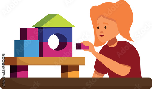 Little girl concentrating on building a colorful house with blocks, developing her creativity and motor skills