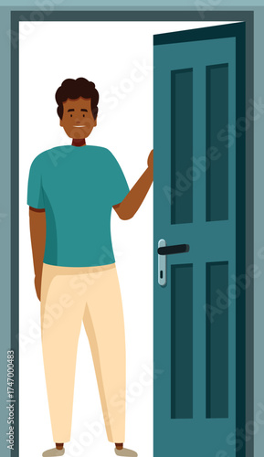 Smiling man opening the door, inviting guests to enter his modern home