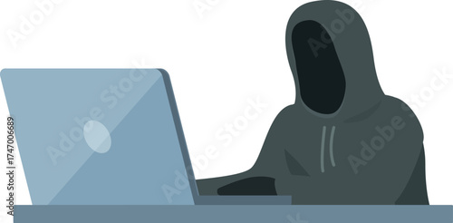 Hacker wearing a hoodie using a laptop at a desk committing a cyber crime
