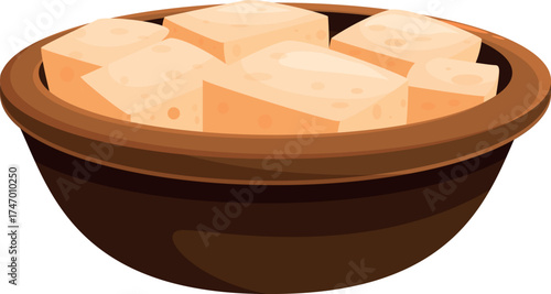 Clay bowl containing several cubes of fresh tofu, a healthy and protein rich ingredient for vegan and vegetarian diets