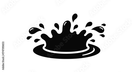 A black splash of liquid depicting a water droplet impact design