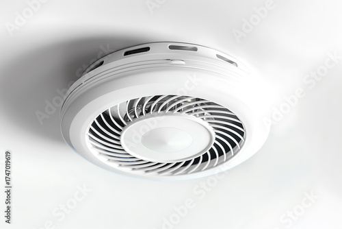 Modern smoke detector isolated on white background with textured circular design
