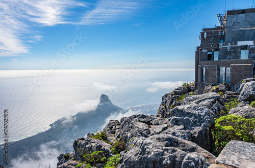 View of Cable Car station, Lions Head mountain and city of Cape Town, South Africa, from top of table mountain