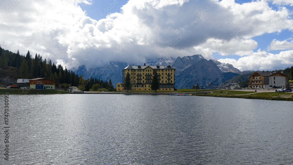 Fototapeta premium Lake Misurina and the asthma center, picturesque view of a mountain in the Italian dolomites.