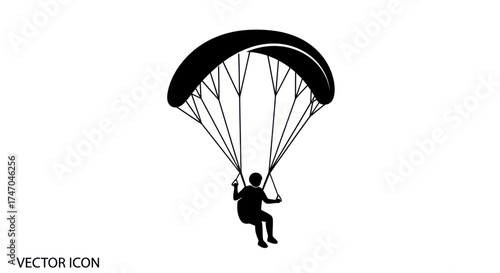 Silhouette of a Paraglider with Canopy and Person.