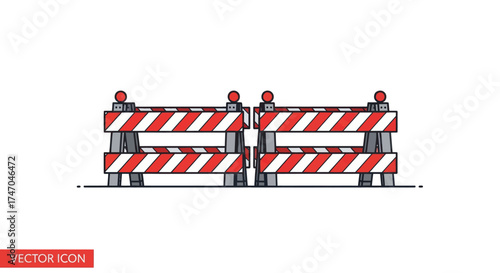 Red and White Striped Construction Barriers with Lights.