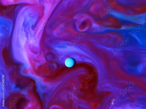 Wallpaper Mural Colorful liquid swirls and a blue sphere creates dynamic visual experience of fluid motion Torontodigital.ca