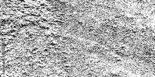 Macro closeup of a rough black and white granite stone wall texture background