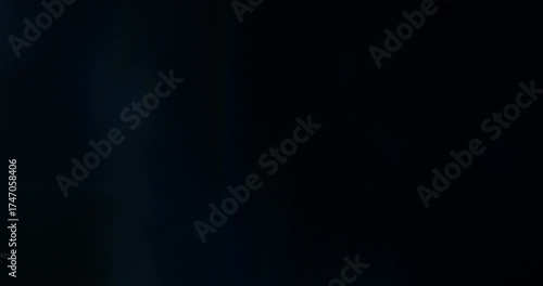 Light Prism With Rainbow Spectrum and Bright Glare On Dark Background