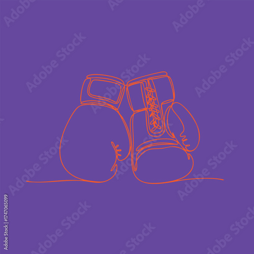 Pair of boxing gloves with laces and padding resting on a flat , symbolizing combat sports and athletic training