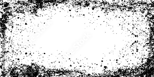 Grunge black and white distress texture. Scratch texture. A textured, black and white graphic with a radial pattern of dots creates a striking border around a blank center.
