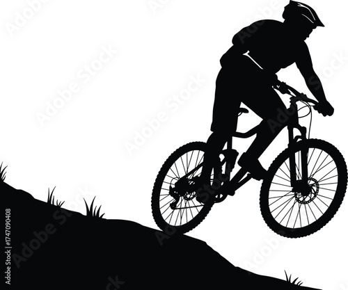Silhouette of mountain biker riding downhill on rough terrain representing adventure, outdoor sports, endurance, freedom, and extreme cycling