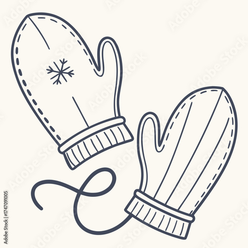 Pair of white mittens with snowflake icon and string