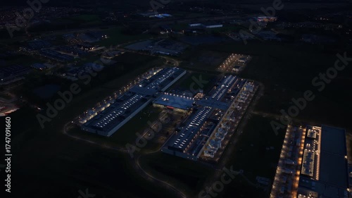 Night aerial of data center with AI and cloud computing servers.