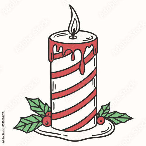 Christmas candle with red stripes and holly dripping
