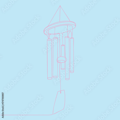 Colorful wind chime hanging outdoors with a clear sky , creating a soothing and decorative musical accessory for outdoor spaces