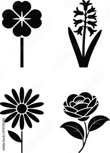 Four elegant botanical silhouettes featuring flowers and a four leaf clover