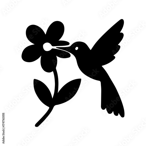 Silhouette of a hummingbird feeding from a stylized flower