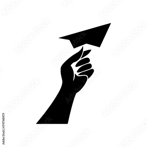 Hand holding a paper airplane silhouette