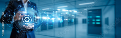 Businessman hand hold DevOps, CI/CD pipelines, cloud deployment, software automation, agile development, infrastructure as code, containerization, Kubernetes solutions, continuous monitoring