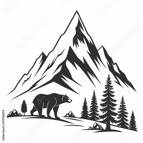 Black bear walking in front of snow capped mountains and pine trees