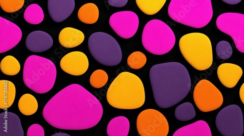 Abstract colorful pebble shapes on a black background.